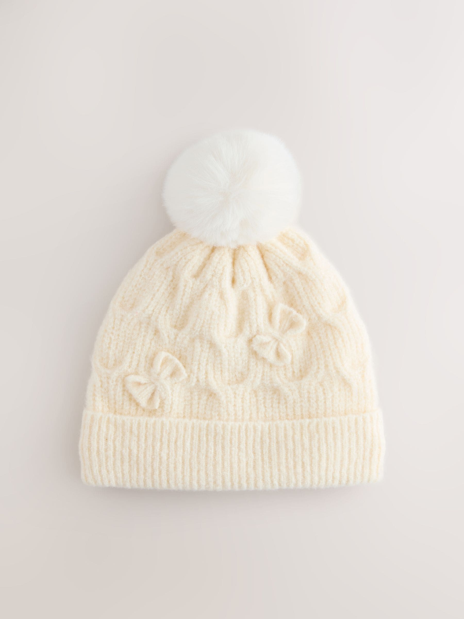 Crème - Beanie-muts met strik (1-16jr)