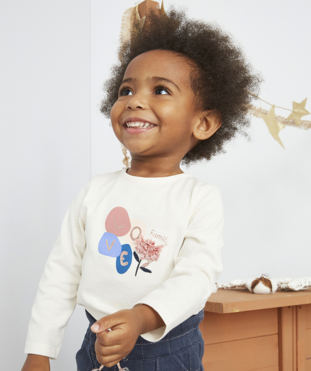 T-SHIRT BÉBÉ FILLE EN COTON BIO AVEC MESSAGELOVE ET FLEUR RELIEF