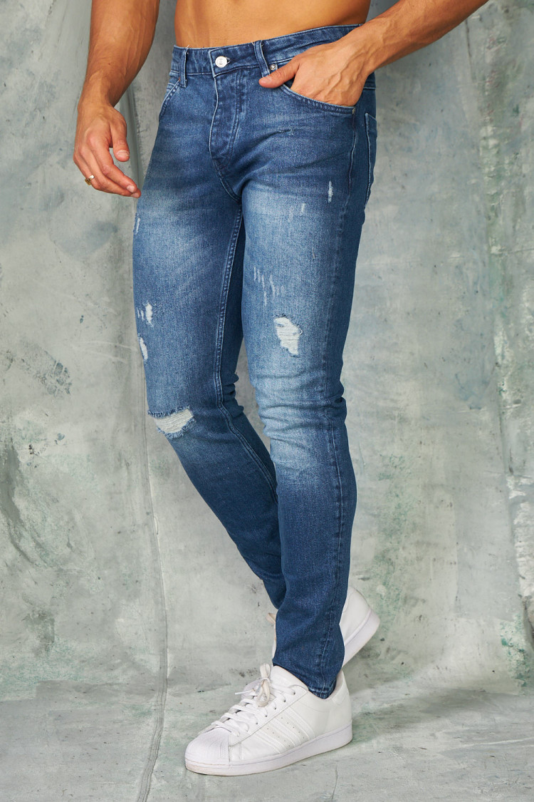 Jeans slim bleu foncé délavé déchiré