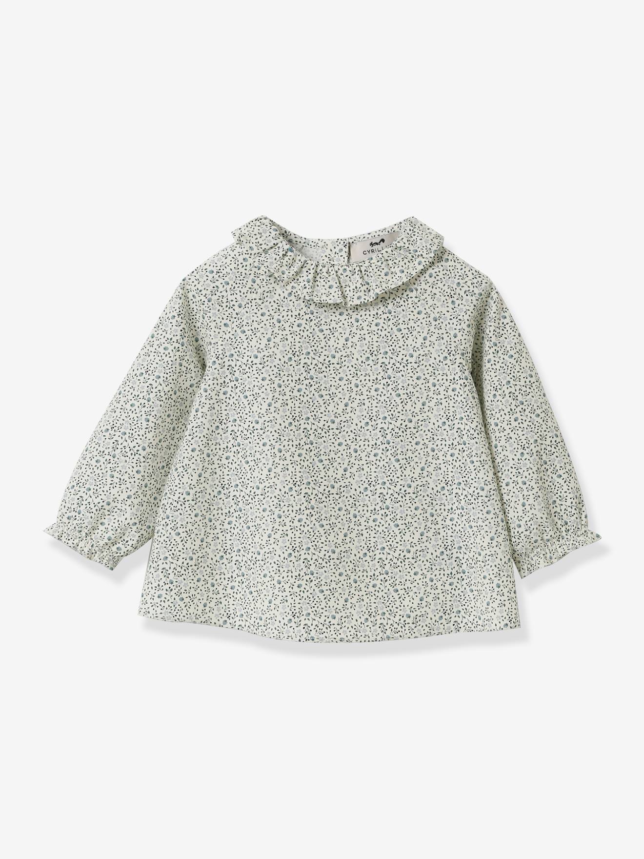 Blusa infantil CYRILLUS com estampa floral azul.