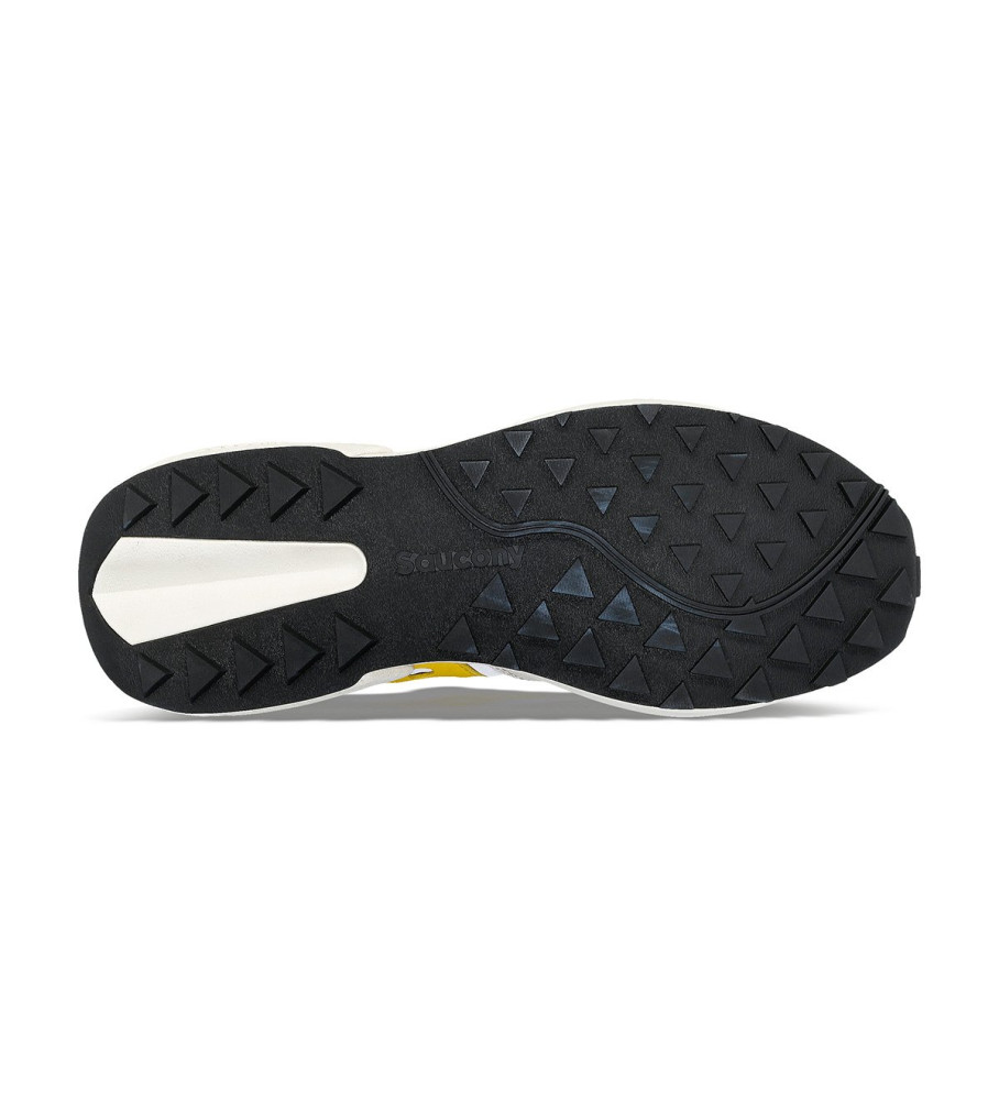 Tênis Saucony Jazz Nxt de couro, branco e amarelo.