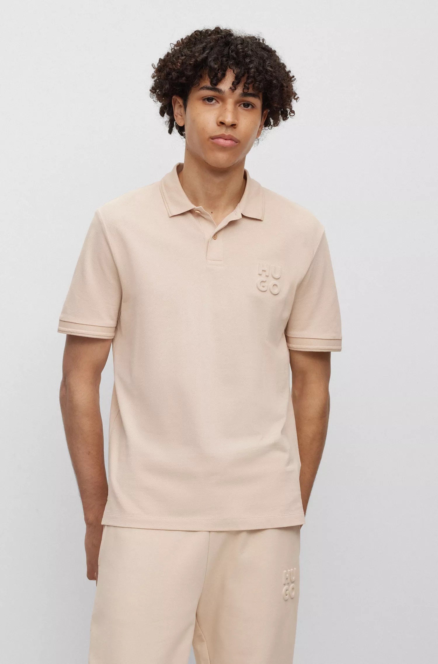 Camisa polo HUGO vermelha com logo em relevo em piqué de algodão;