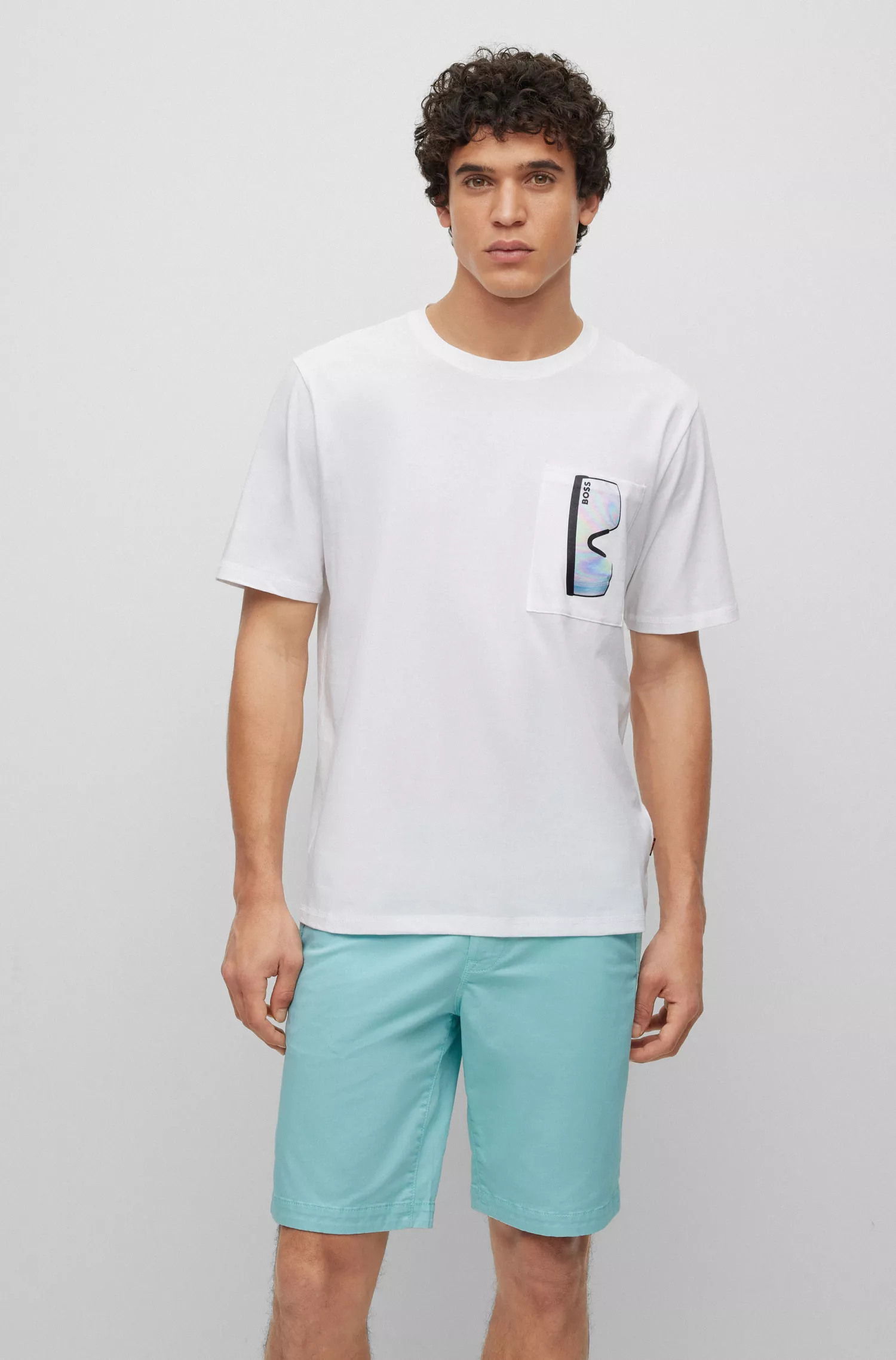 Camiseta BOSS laranja, modelagem relaxada, em algodão, com estampa na frente e nas costas.