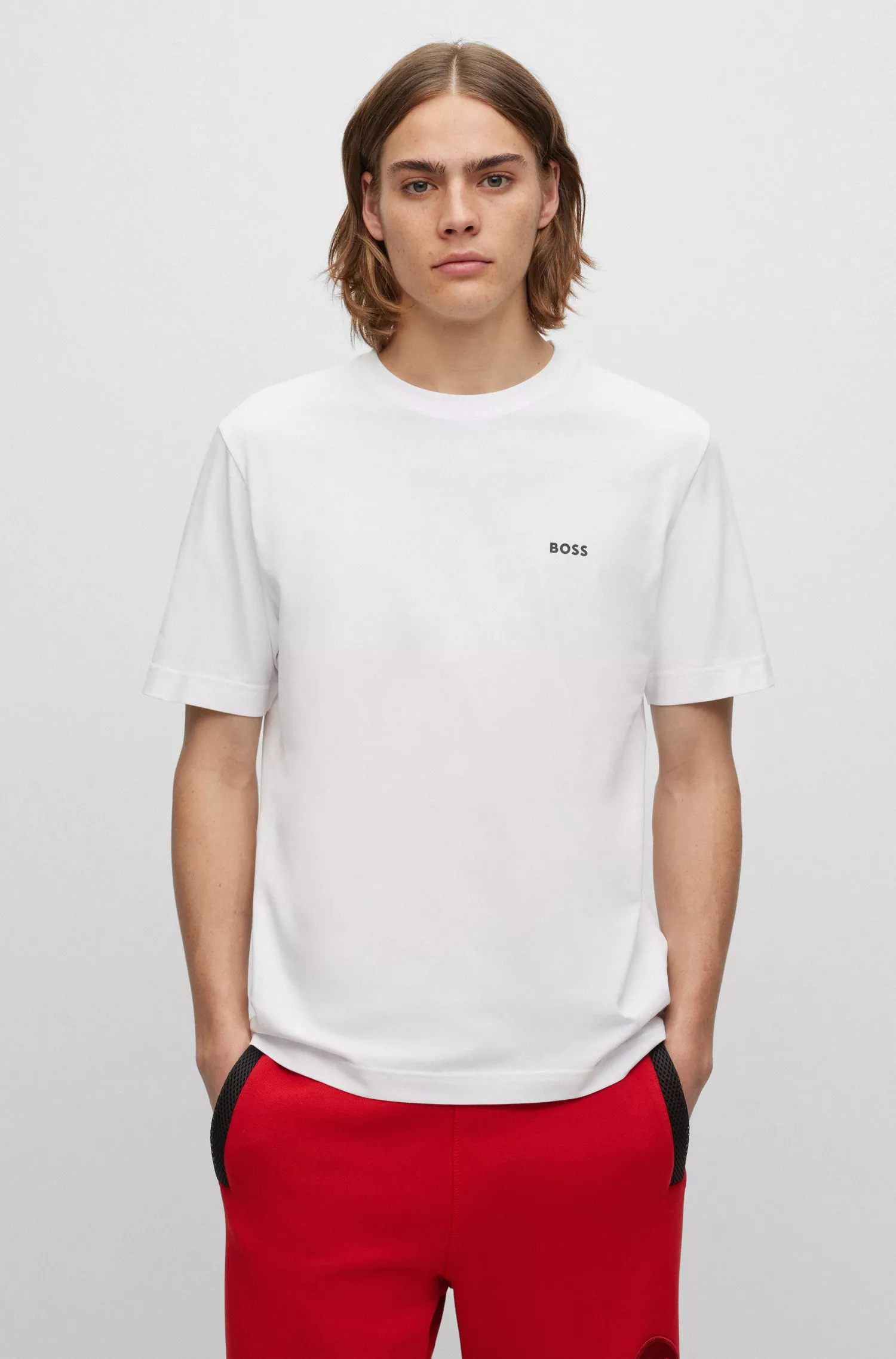 Camiseta BOSS laranja, de algodão com modelagem relaxada e estampas inspiradas em corridas.