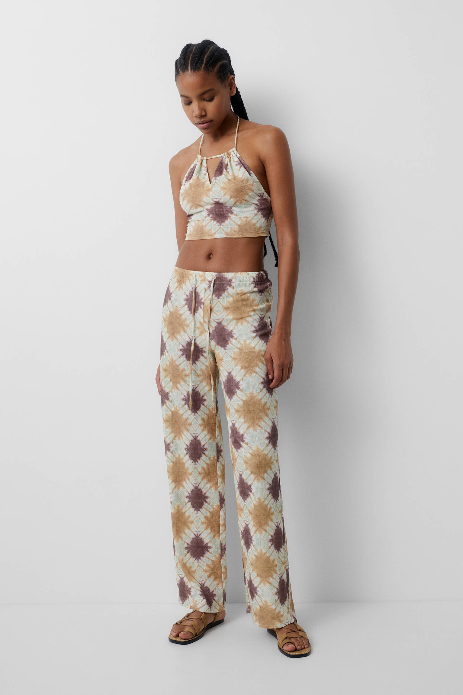 Calça fluida estampada - mostarda