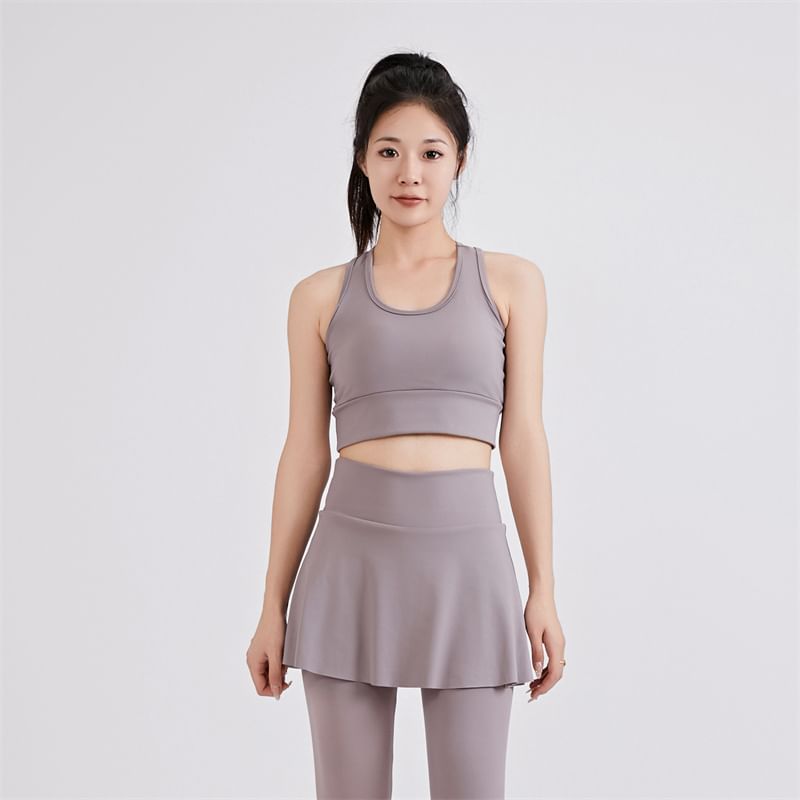 KUMI - Set: Sportieve effen bh-top + yogabroek met hoge taille en rokoverlay