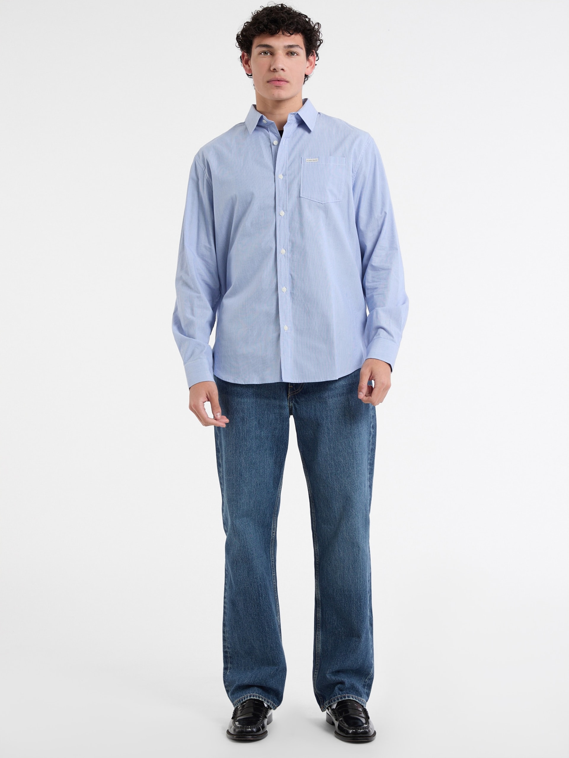 Camisa listrada com bolso