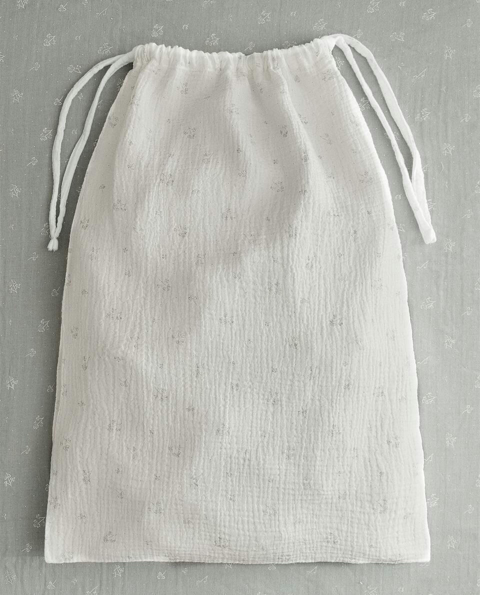 SACO DE ROUPA GRANDE COM ESTAMPA DE TREVO