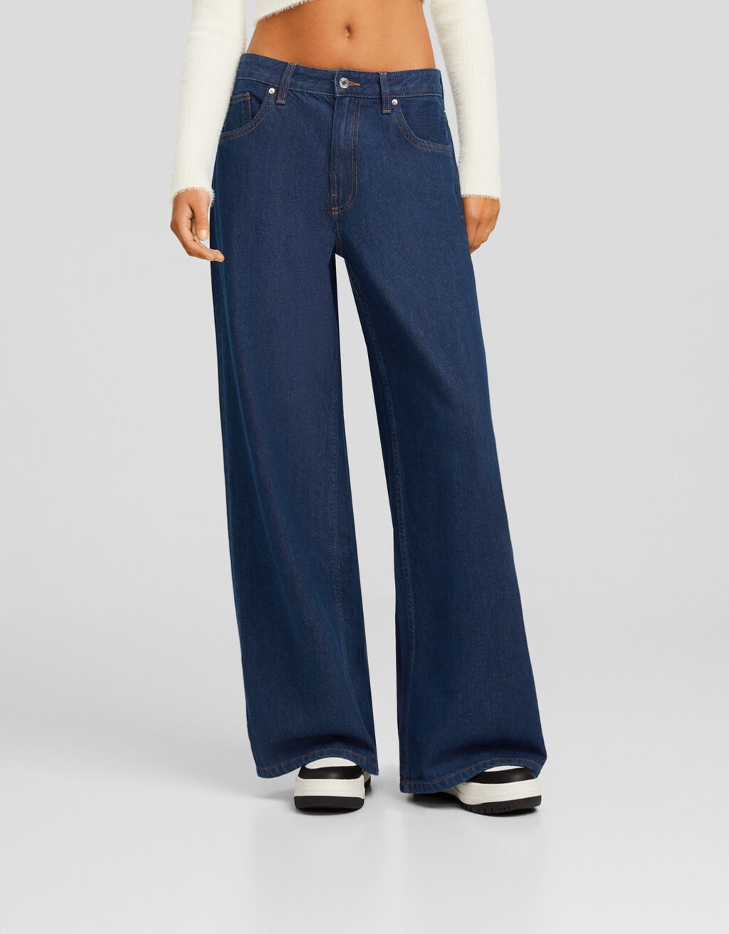 calça jeans de perna larga