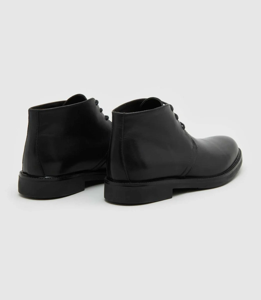 Bottines à lacets en cuir noir 