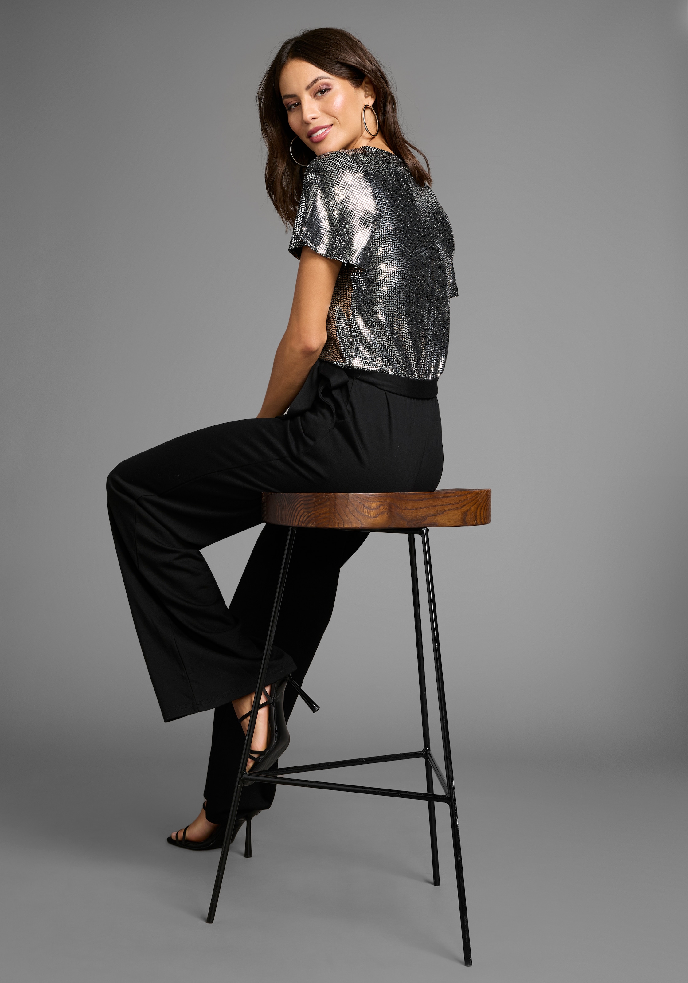 Laura Scott Jumpsuit , mit Glitzereffekten und Gürtel