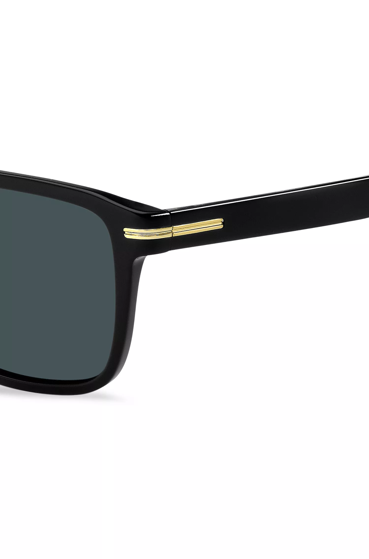 Óculos de sol BOSS em acetato preto com detalhes dourados.
