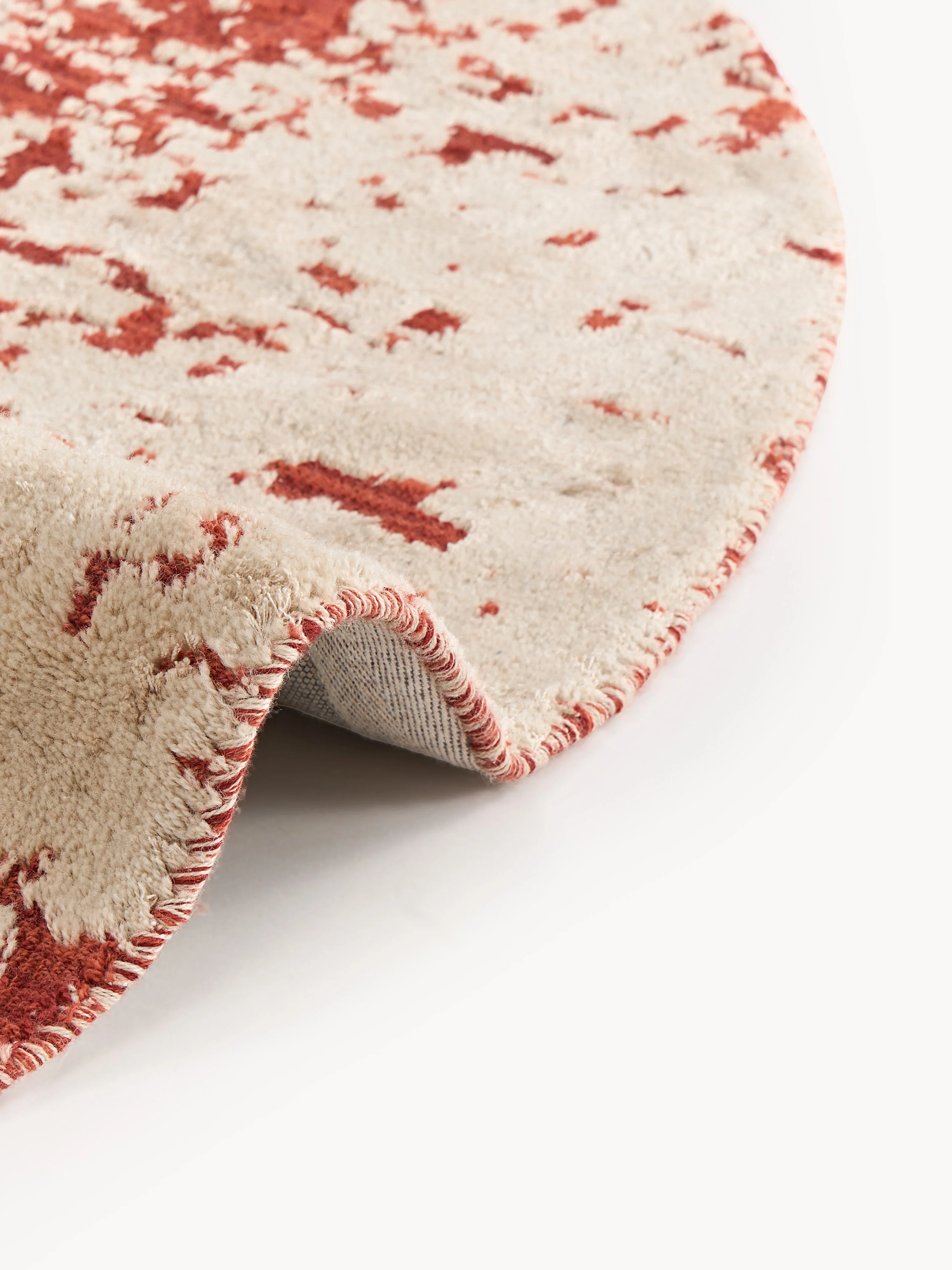 Rond wollen vloerkleed Cynthia met abstract patroon, handgeweven