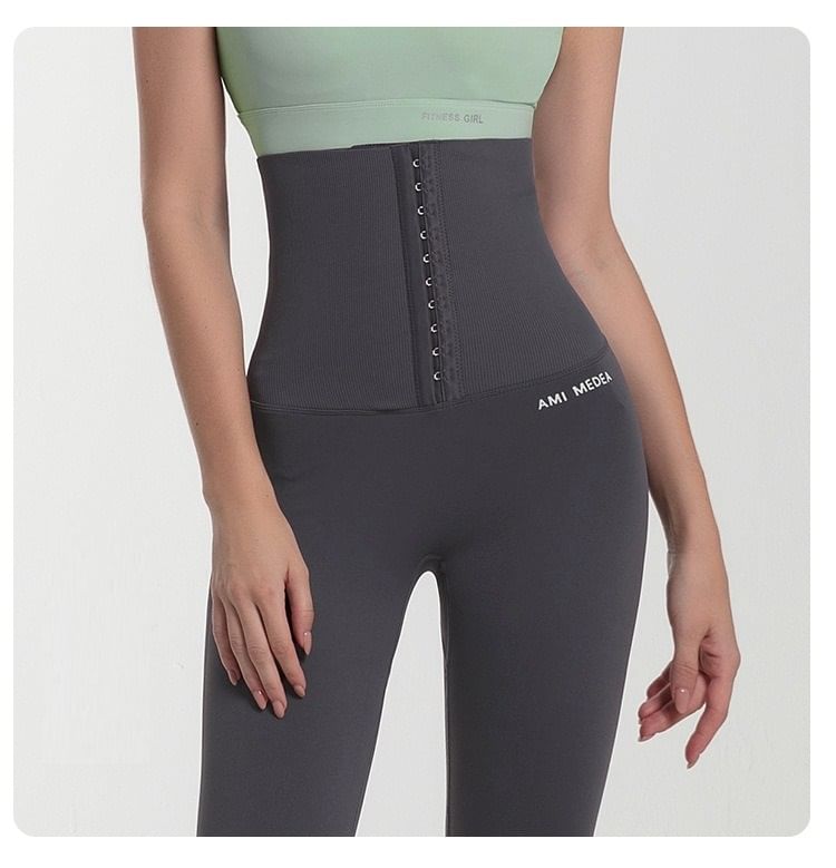 Sishan - Sportlegging met taillevormende letters