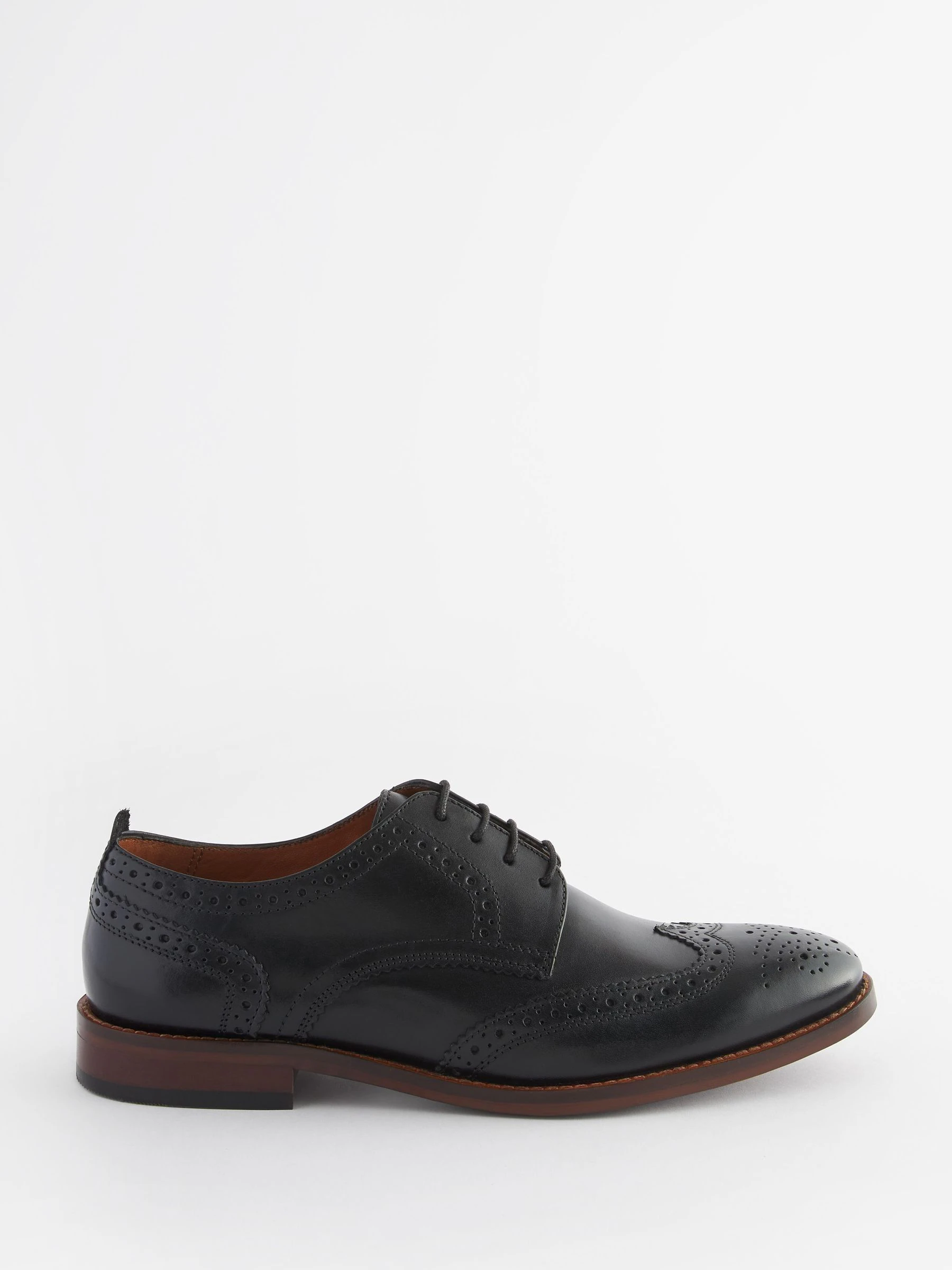 Zwart - Wijde pasvorm - Brogues van leer met contrasterende zool