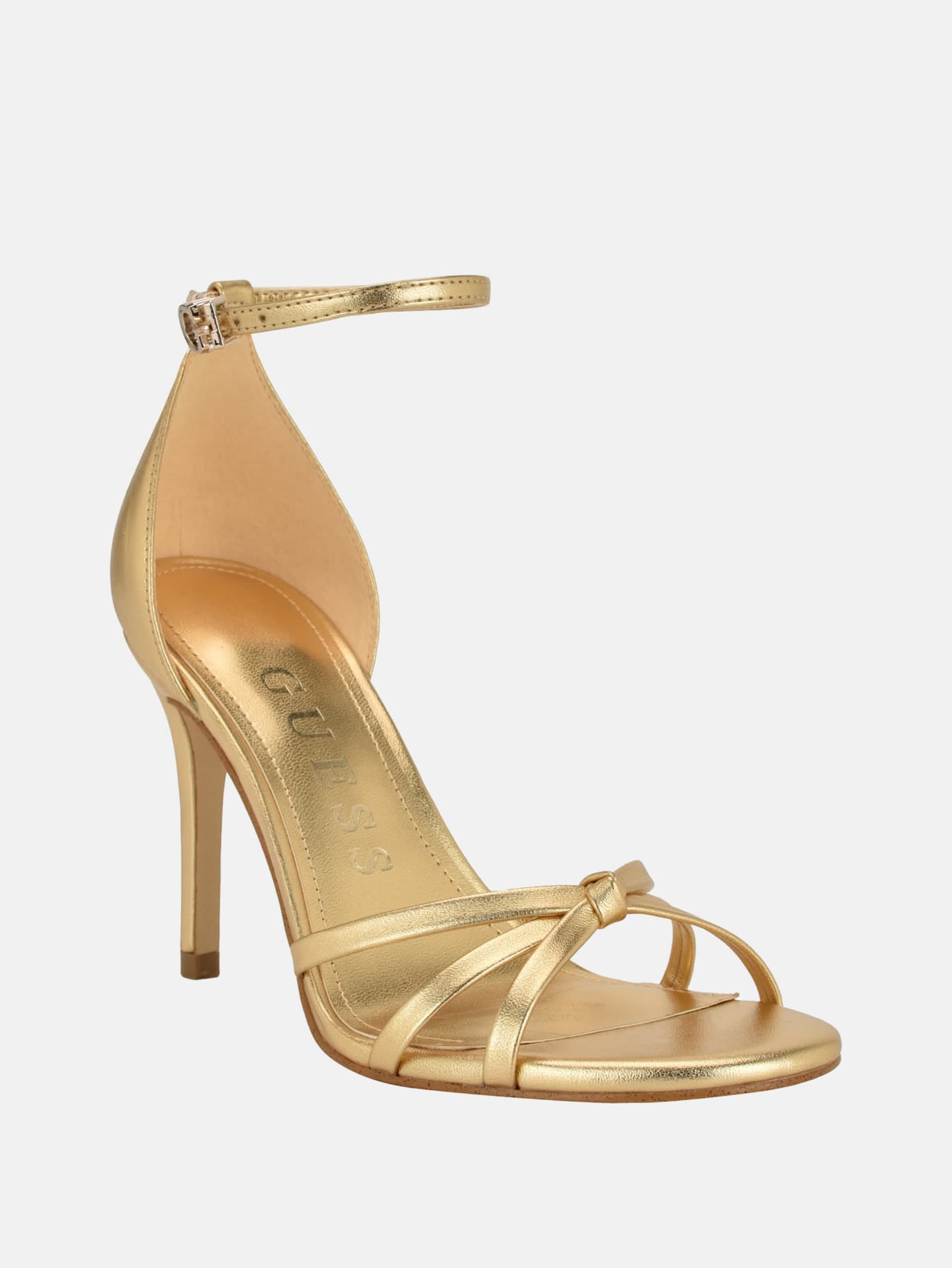 Sapatos de salto agulha com nó de primavera