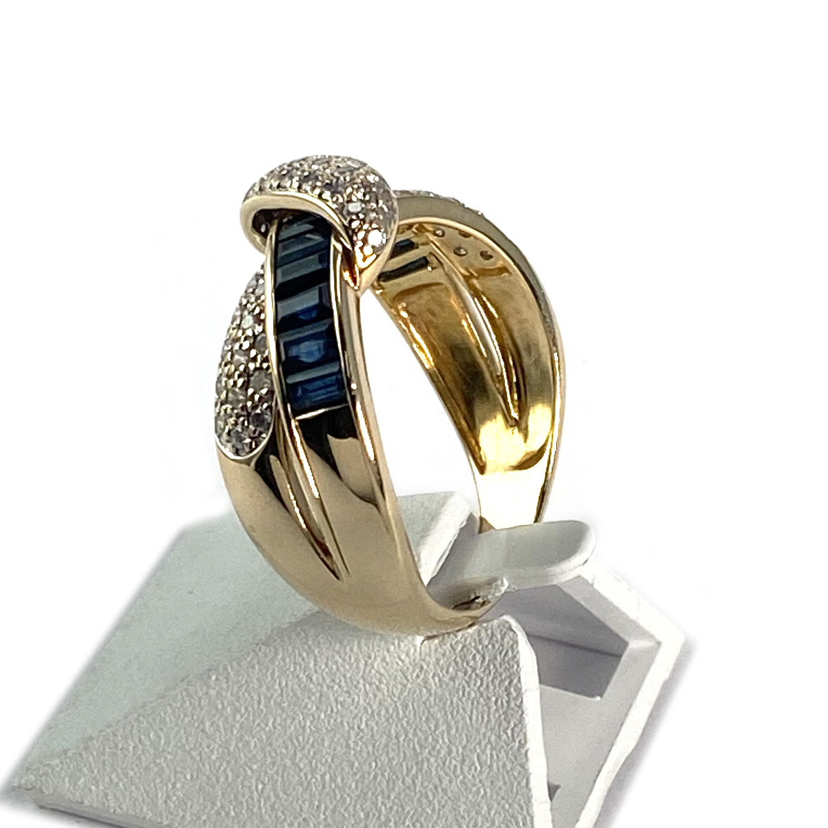 Bague d'occasion entrelacée or 750 jaune saphirs et diamants