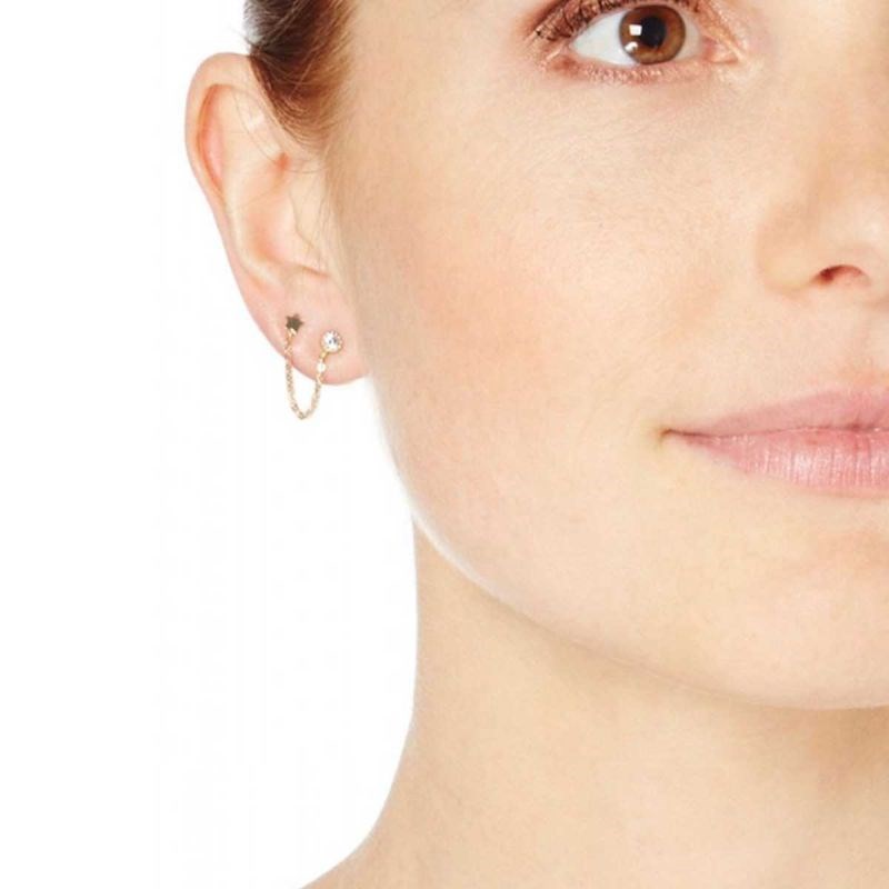 Boucle d'oreille or jaune et oxydes de zirconium 