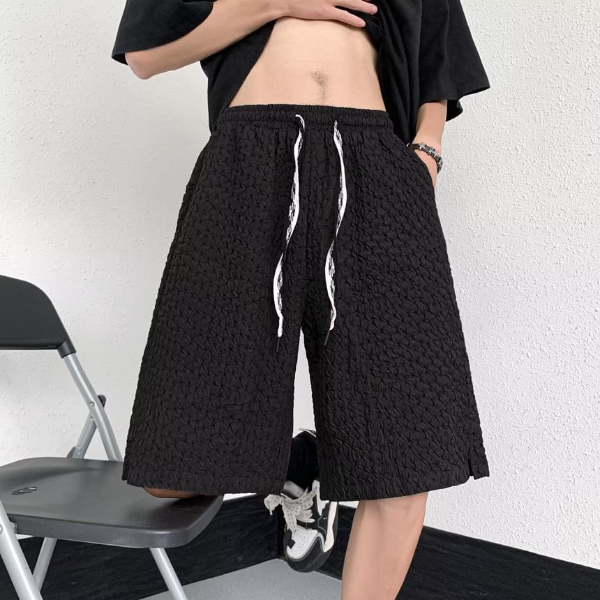 Maxelane - Effen shorts met trekkoord en split