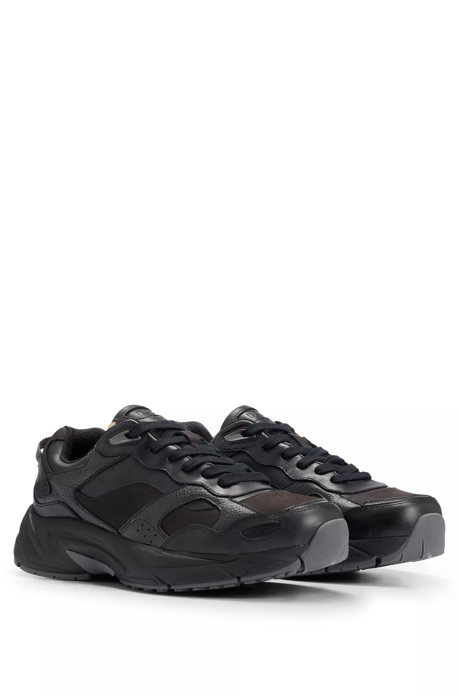 Tênis BOSS Black-Running inspirados em couro misto.