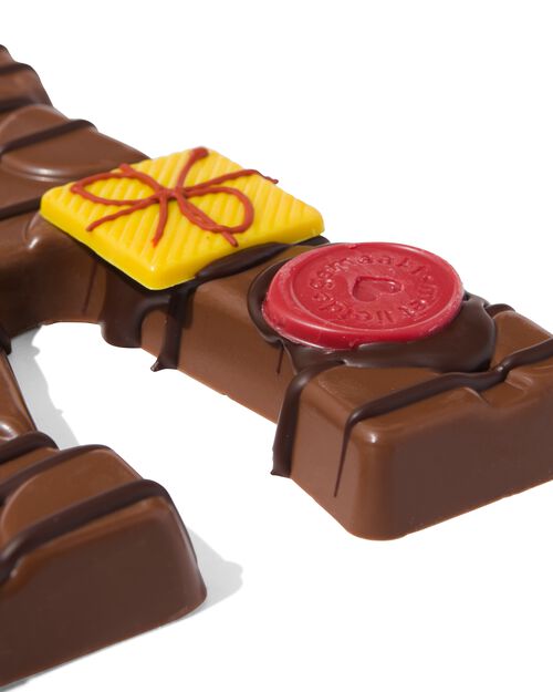 lettre V en chocolat au lait décorée à la main 200g