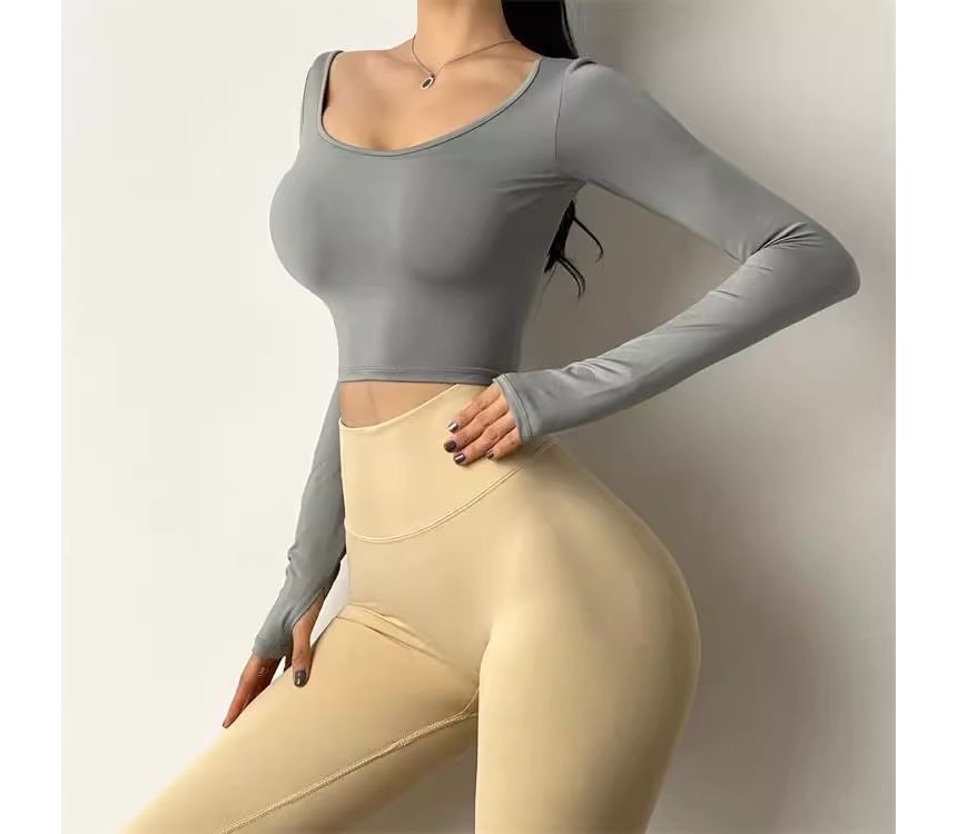 CUCURBIT - Sport T-shirt met lange mouwen en open rug