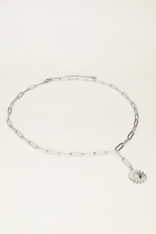 Lange schakelketting met zon