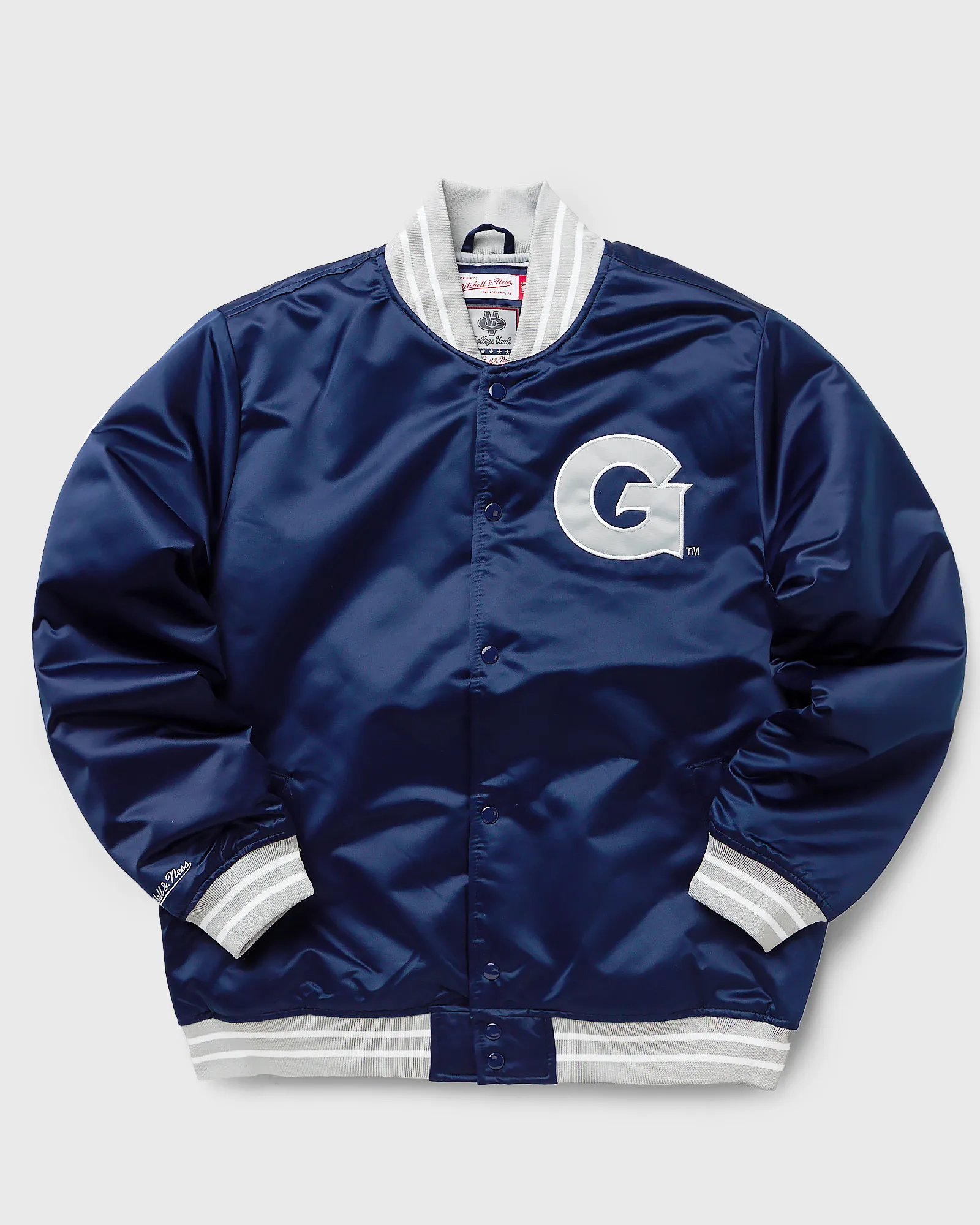 Jaqueta Mitchell & Ness NFL de cetim pesado da Universidade de Georgetown