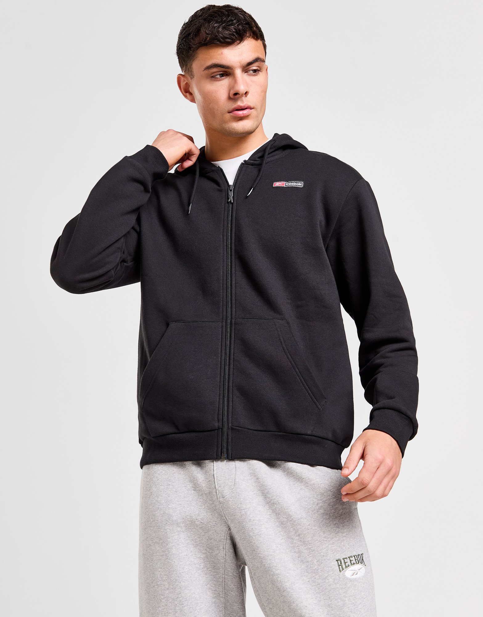 Reebok Sweat à Capuche Zippé Woven Homme