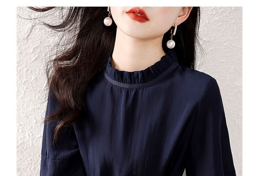Jeonseon - Blouse met korte mouwen en een effen peplumhals