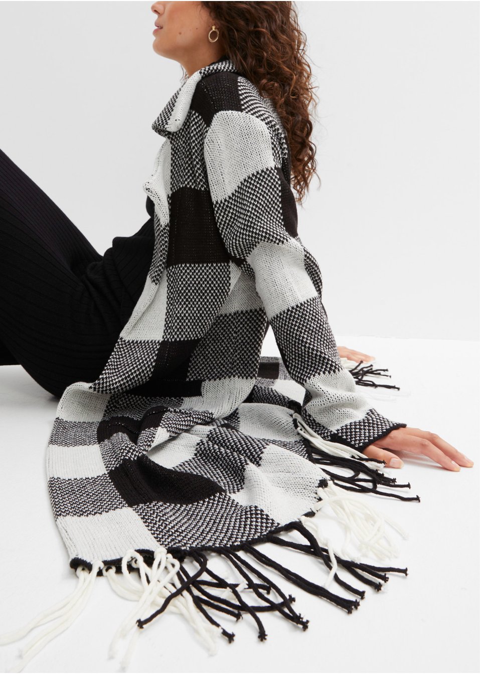 Veste longue en maille à franges