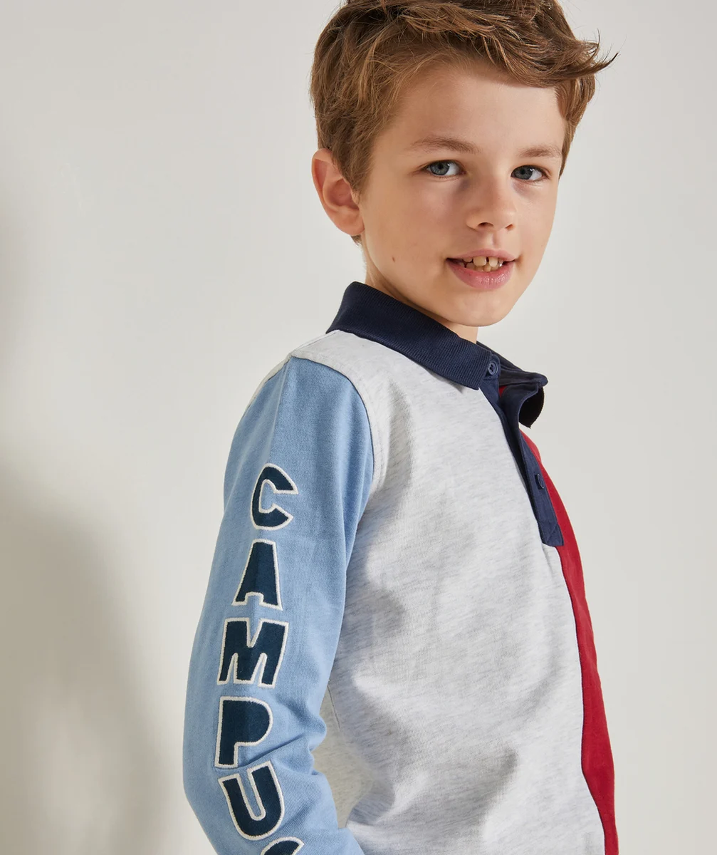 POLO GARÇON EN COTON BIOLOGIQUE COLORBLOCK AVEC MESSAGE