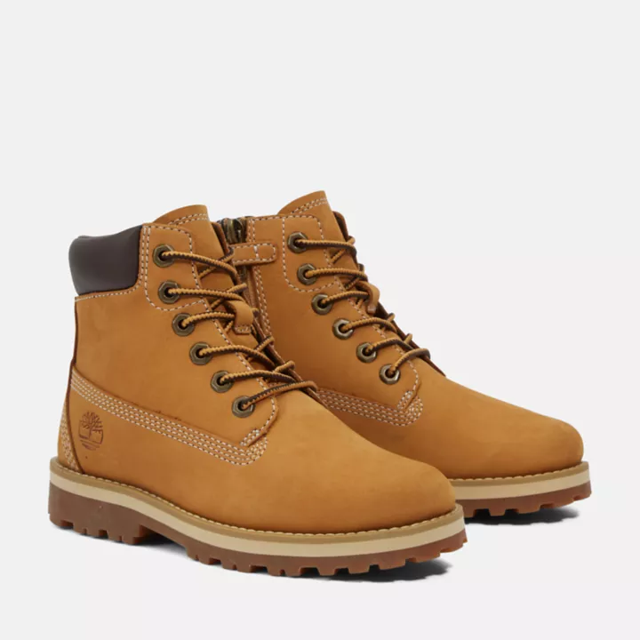 Bota infantil Courma Kid de 15 cm com zíper lateral, na cor amarela.