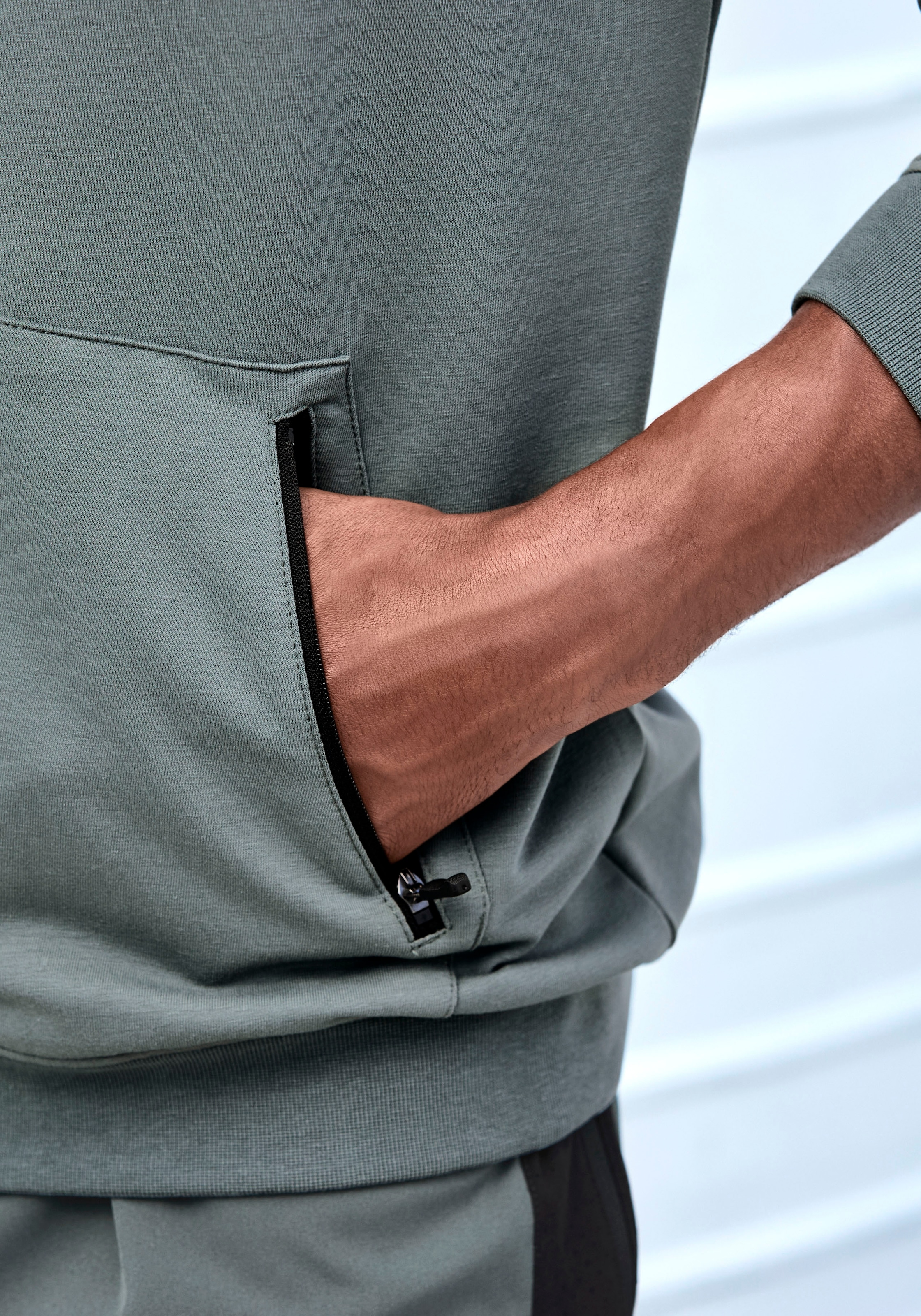 le jogger® Kapuzensweatjacke , mit seitlichen Reissverschlusstaschen
