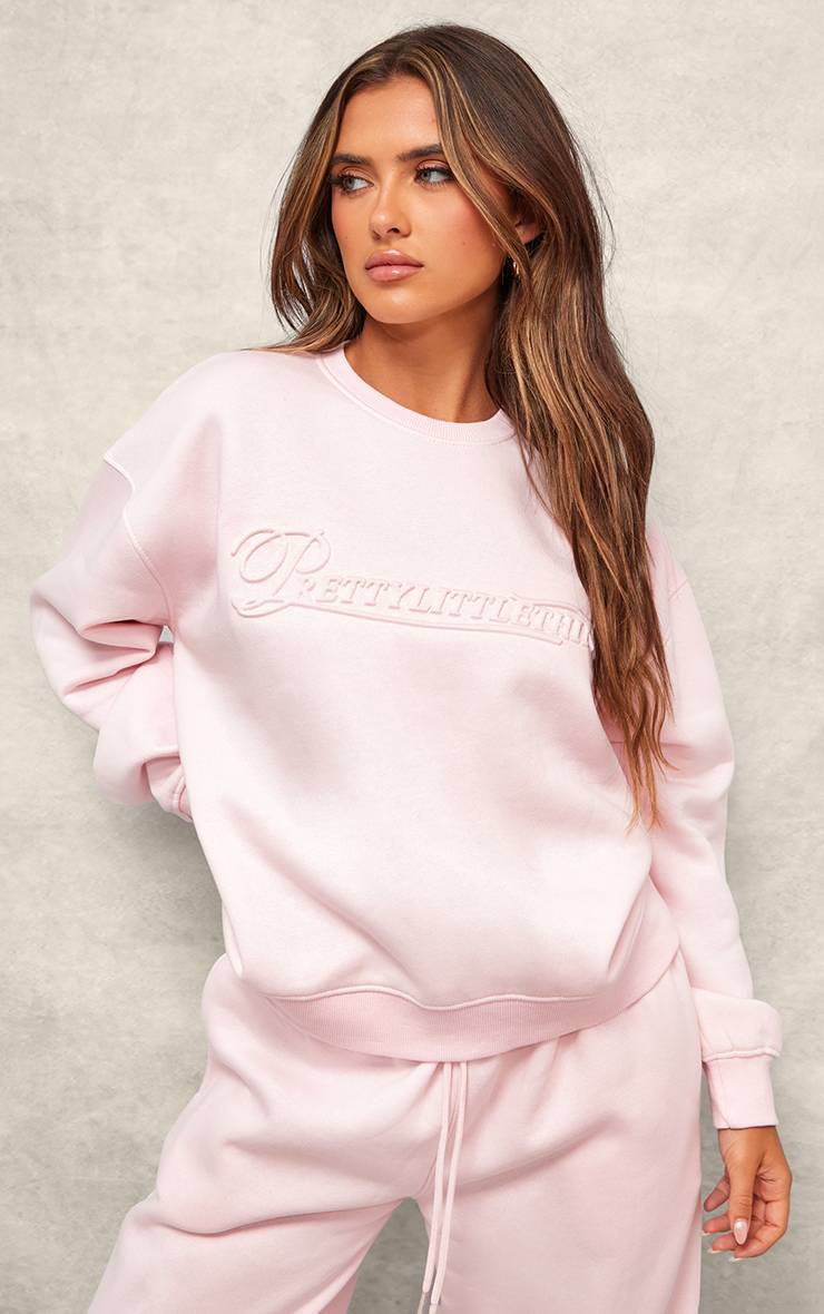 Rose Bébé Sweat-shirt Oversize Prettylittlething Avec Graphisme En Relief