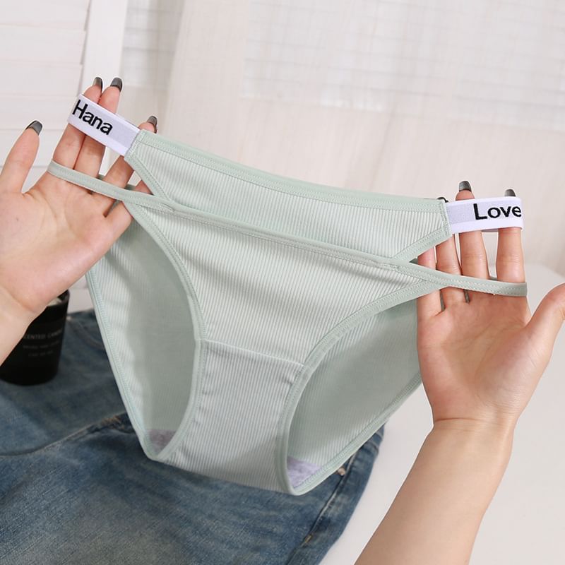 Lexama - Bikinibroekje met tekst en bandjes