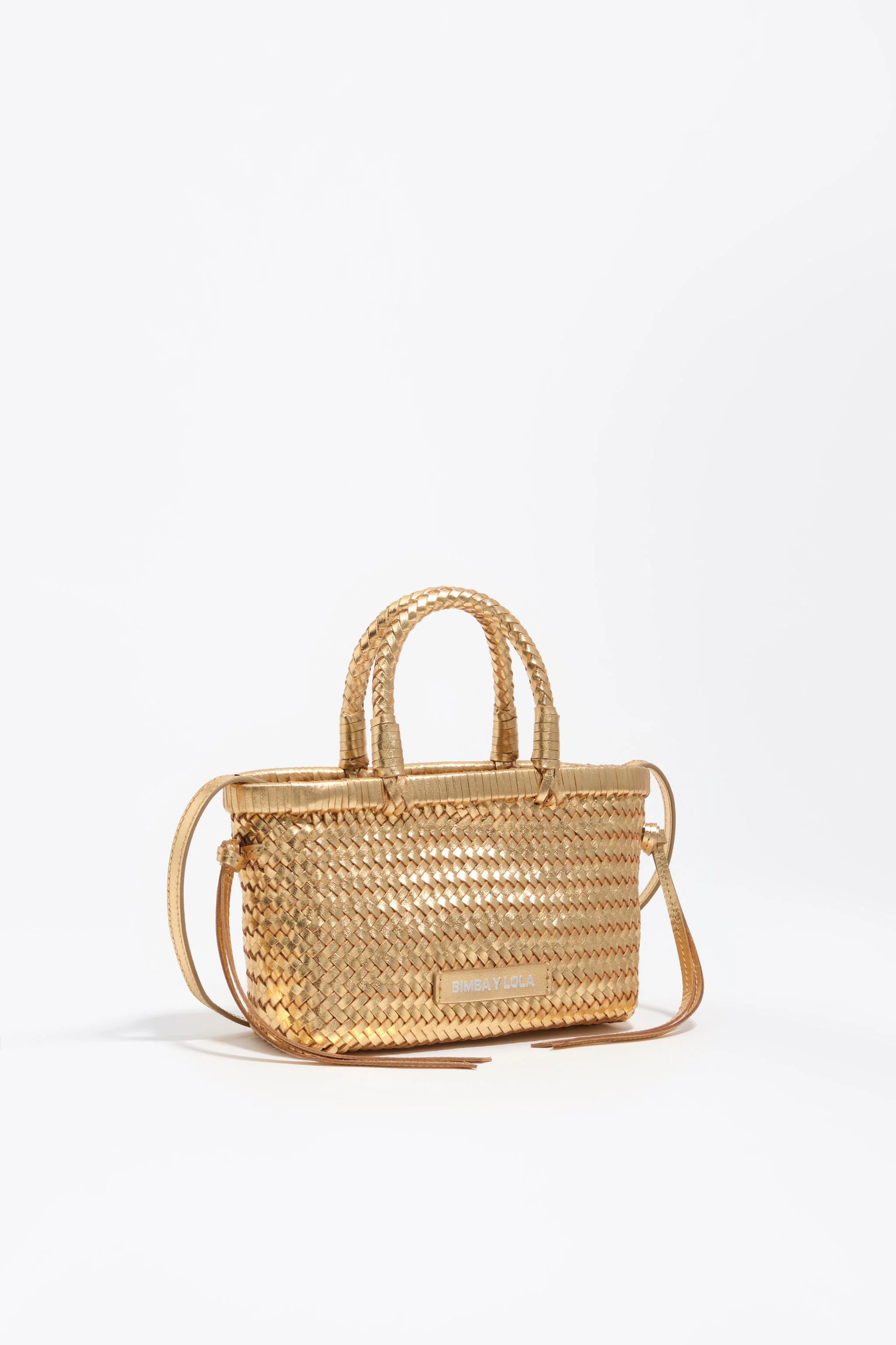 Bolsa pequena de couro trançado dourado
