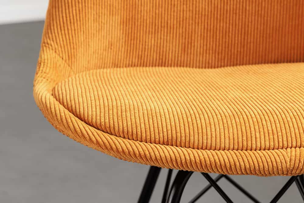 Design Stuhl SCANDINAVIA MEISTERSTÜCK senfgelb Cord schwarze Metallbeine