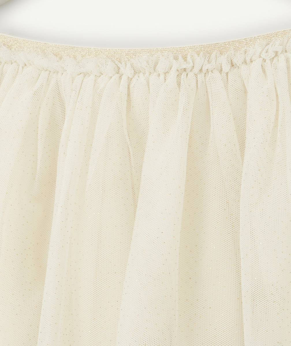 JUPE COURTE ET TOUNANTE EN TULLE AVEC POIS COULEUR DORÉE BÉBÉ FILLE