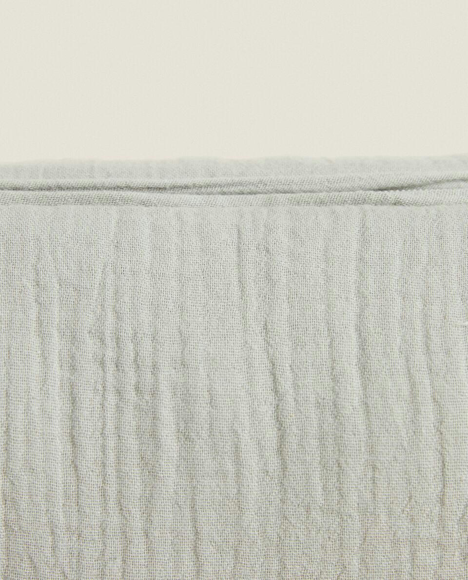Nécessaire de algodão musselina com estampa de trevo