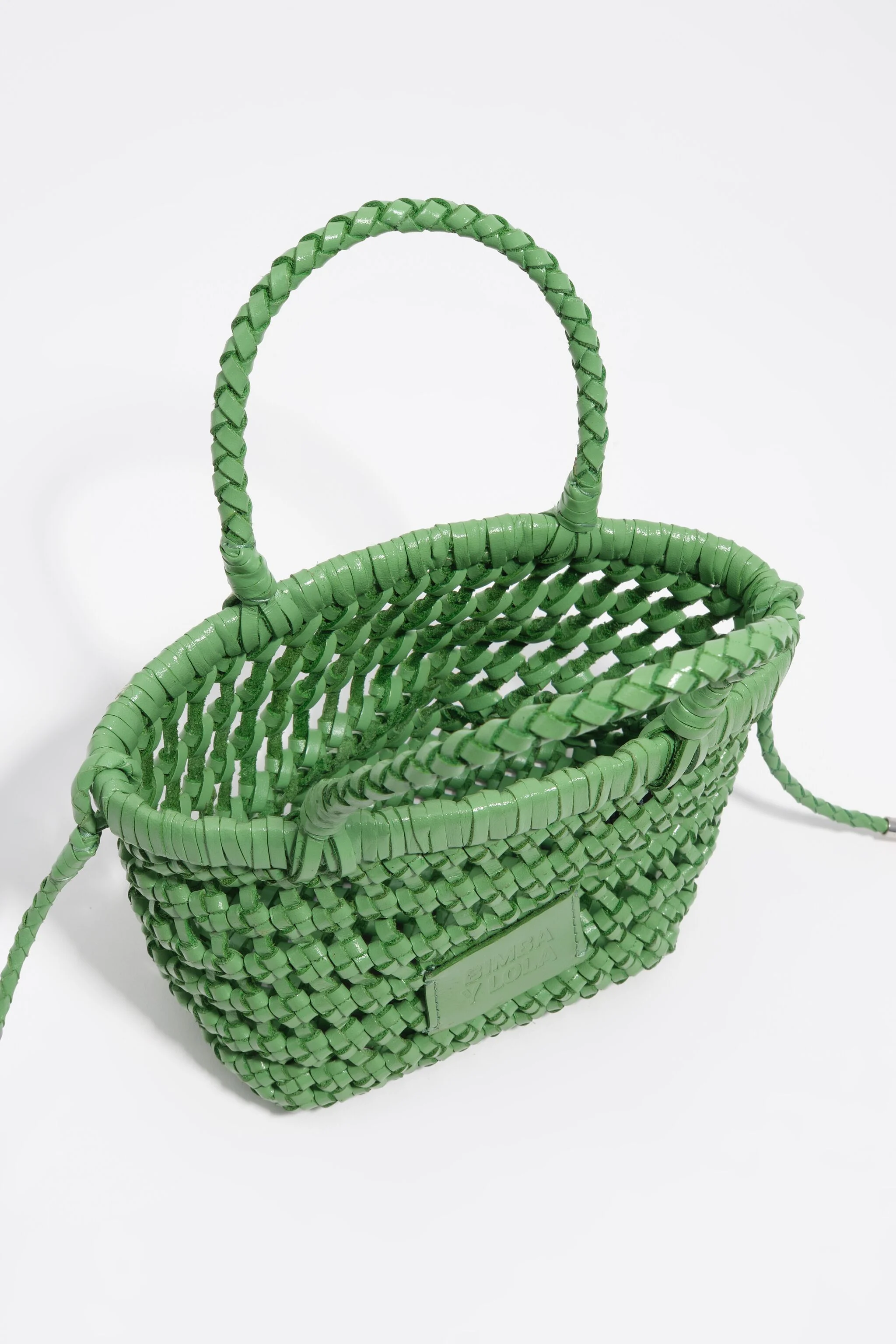 Bolsa mini de couro trançado esmeralda