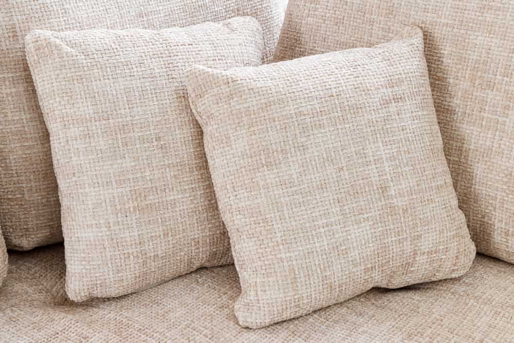 Moderne Wohnlandschaft KENT 220cm champagner beige Strickstoff Ecksofa inkl. Hocker