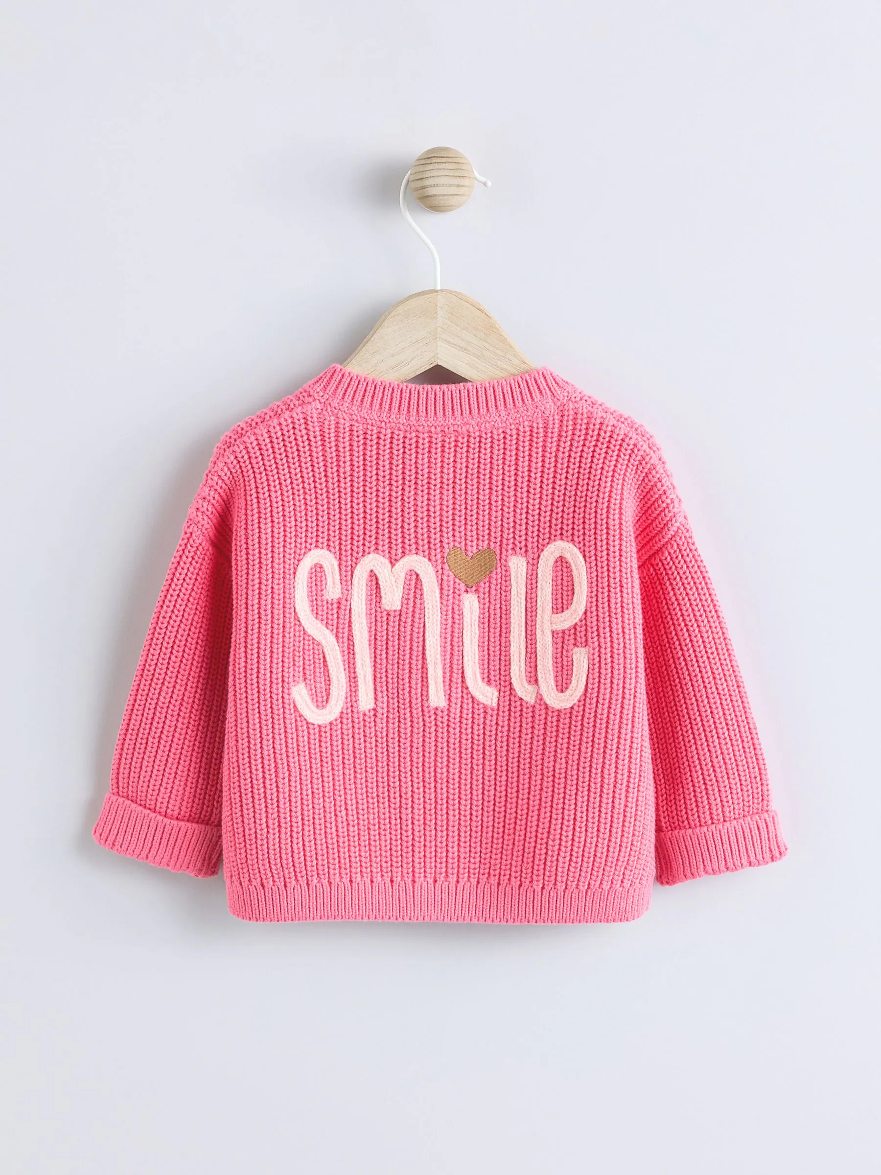Roze met smiley - Geborduurd vest (0 mnd - 2 jr)