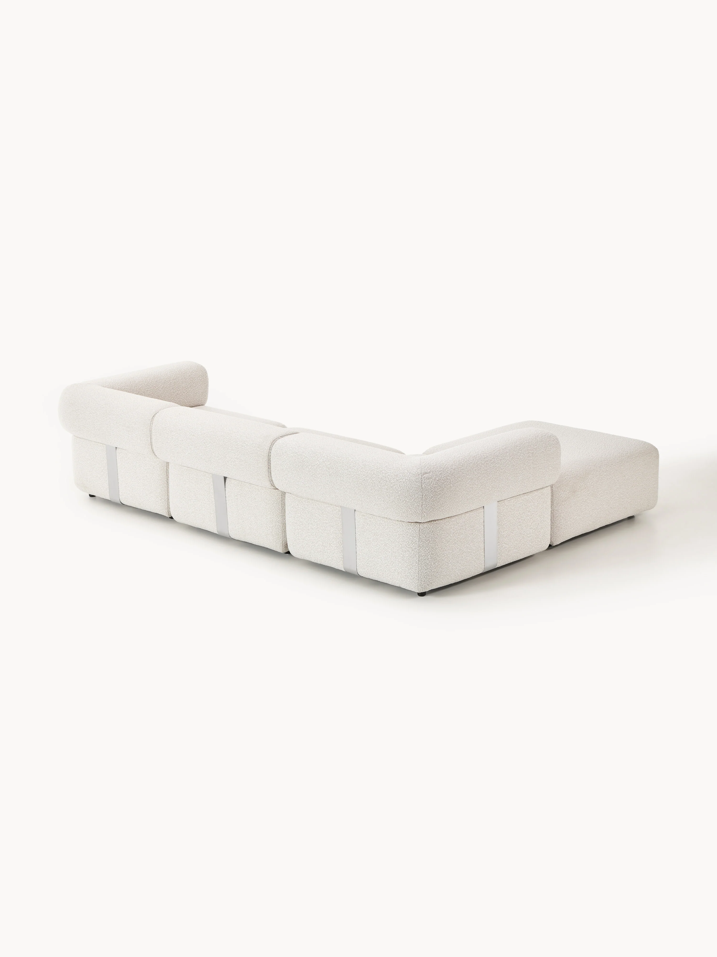 Modulaire bouclé bank Anton (4-zits) met poef (links/rechts)