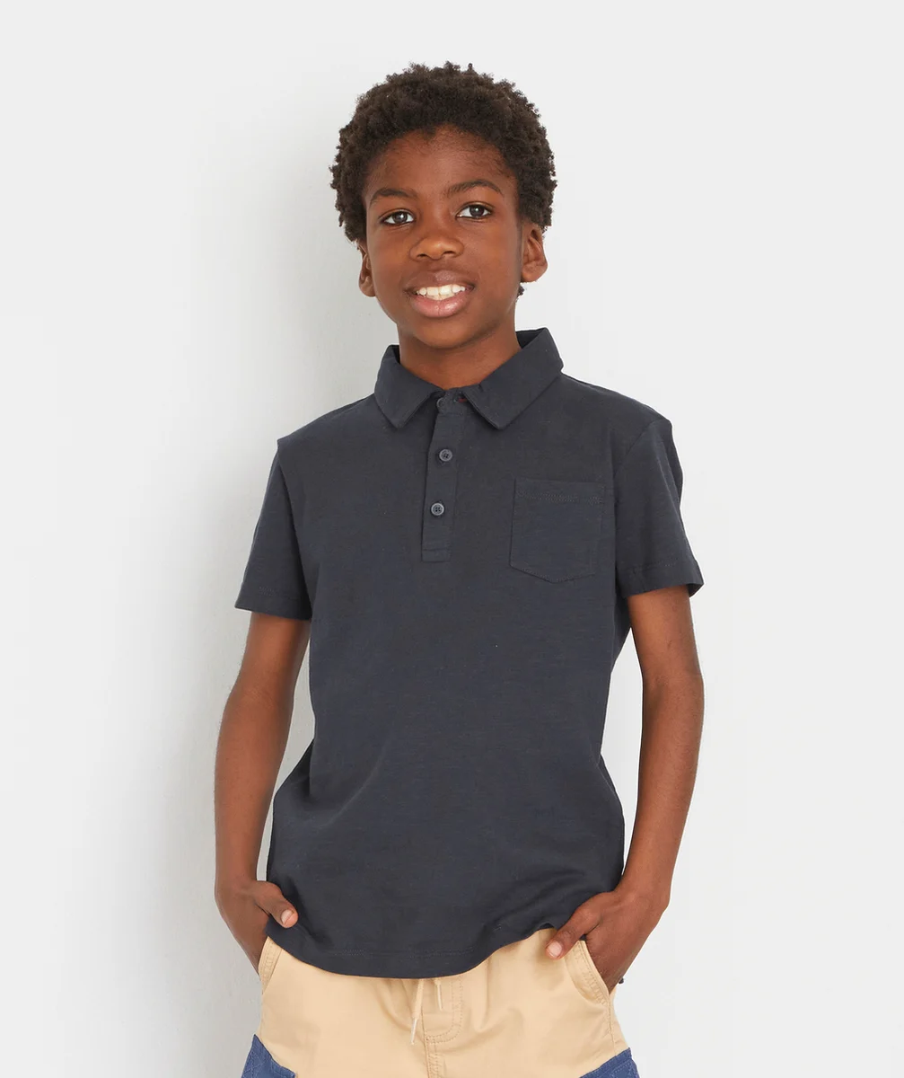 LE POLO MARINE AVEC POCHE SUR LE COEUR