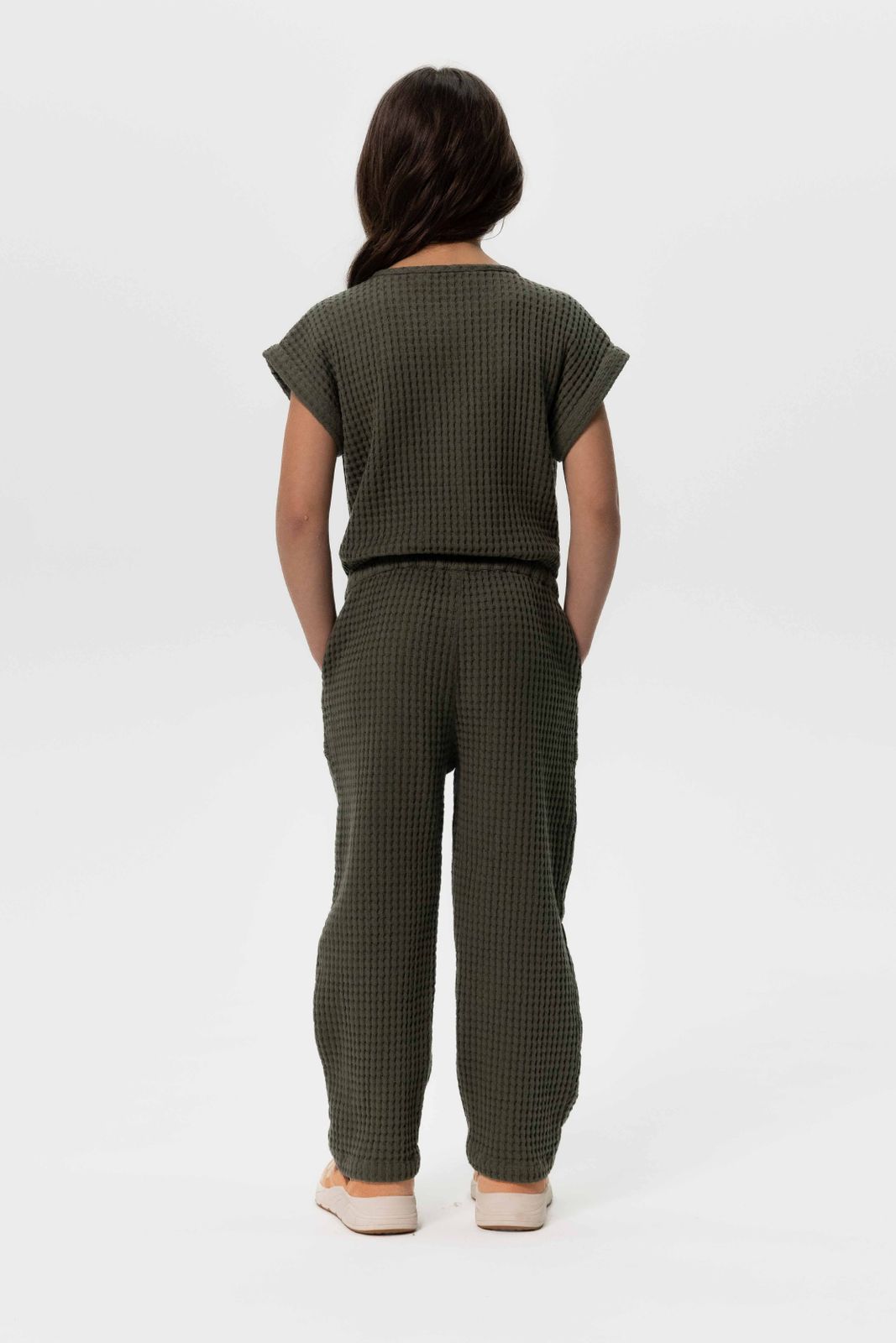 Donkergroene jumpsuit met wafelstructuur