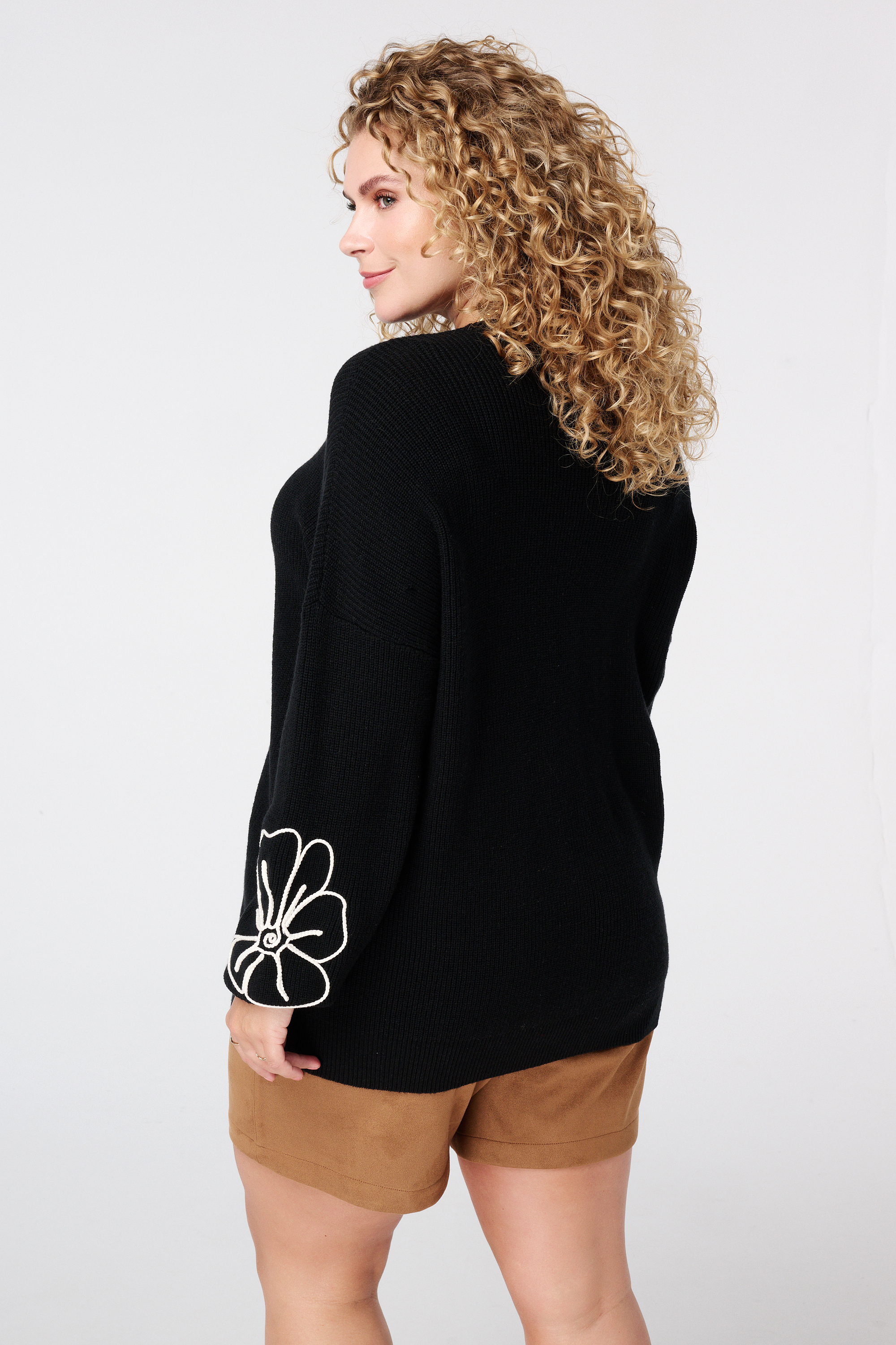 Trui met geborduurde bloemen Zwart