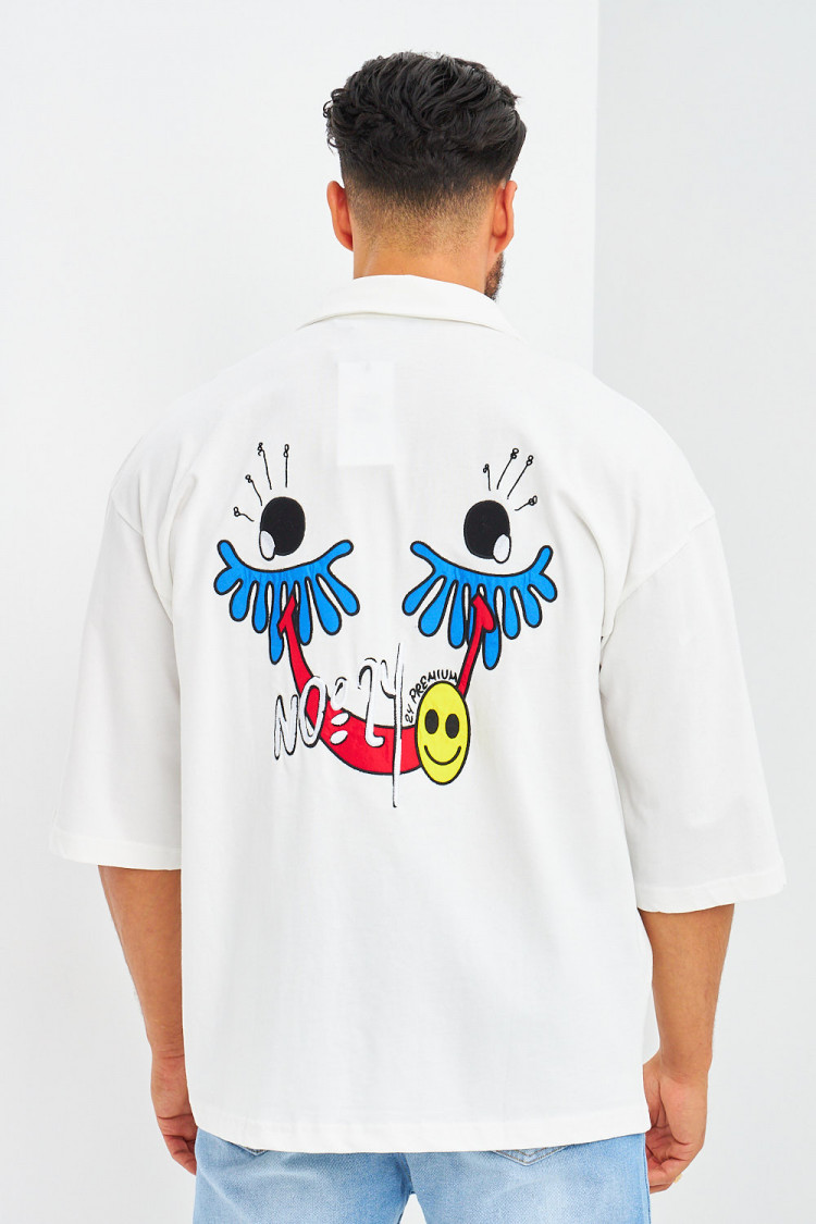 Chemise blanche oversize à patchs