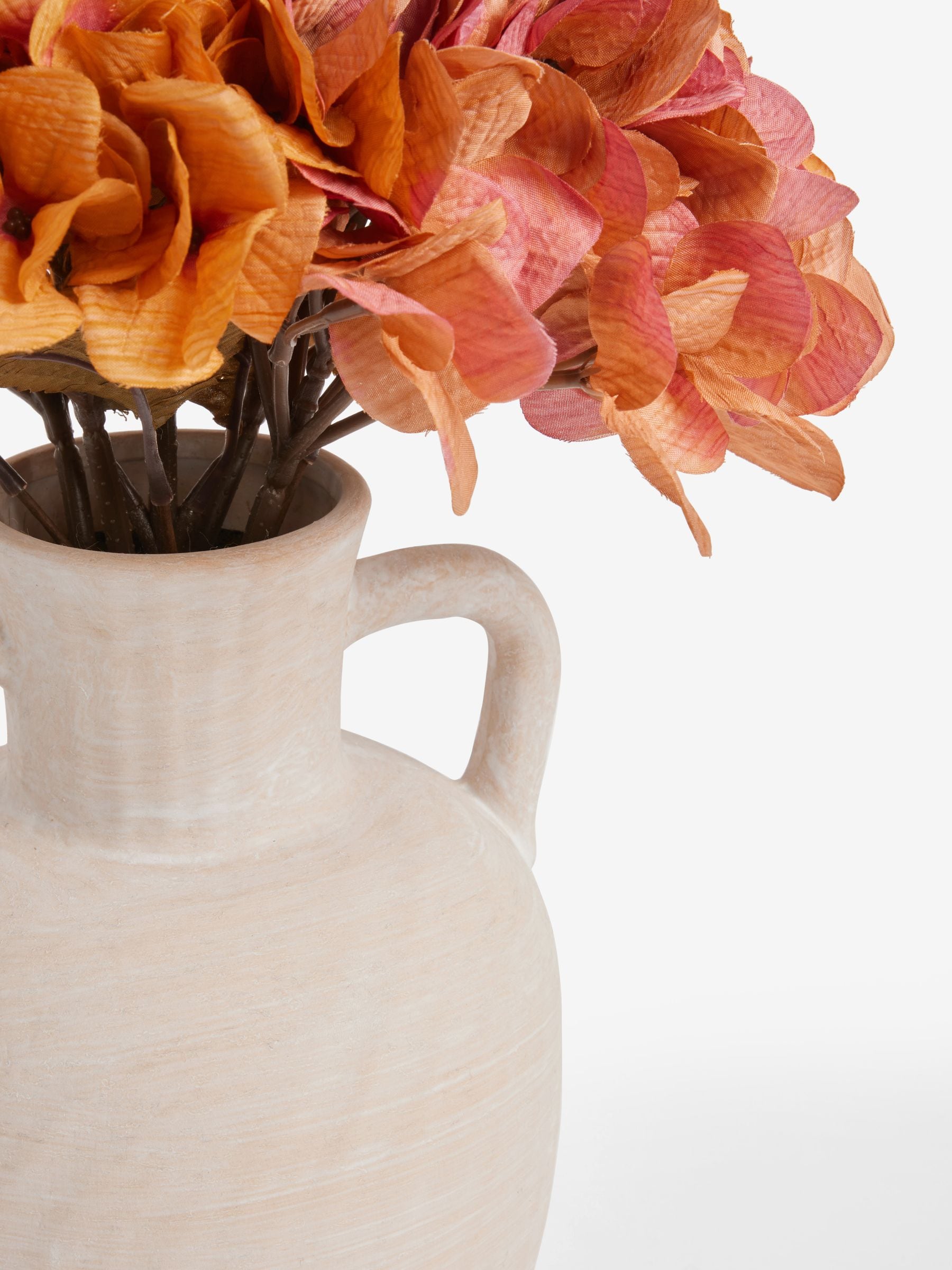 Artificial Hydrangea Heads In Large Ceramic Urn Vase