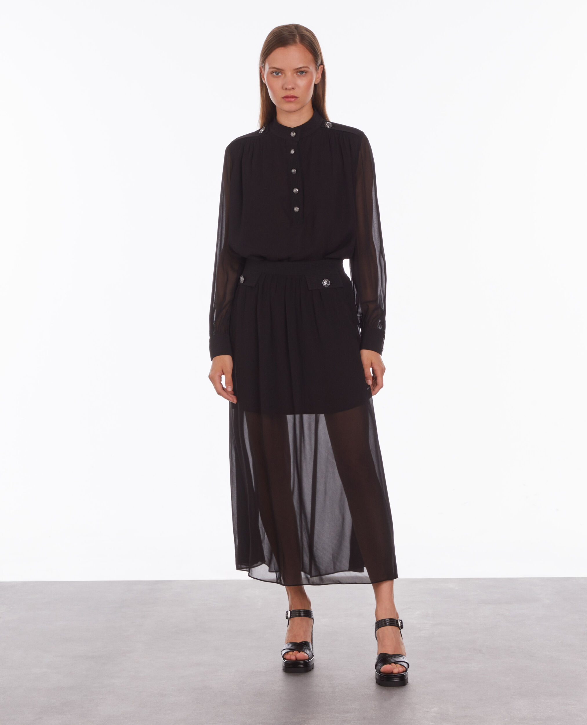 Top noir avec boutons bijoux